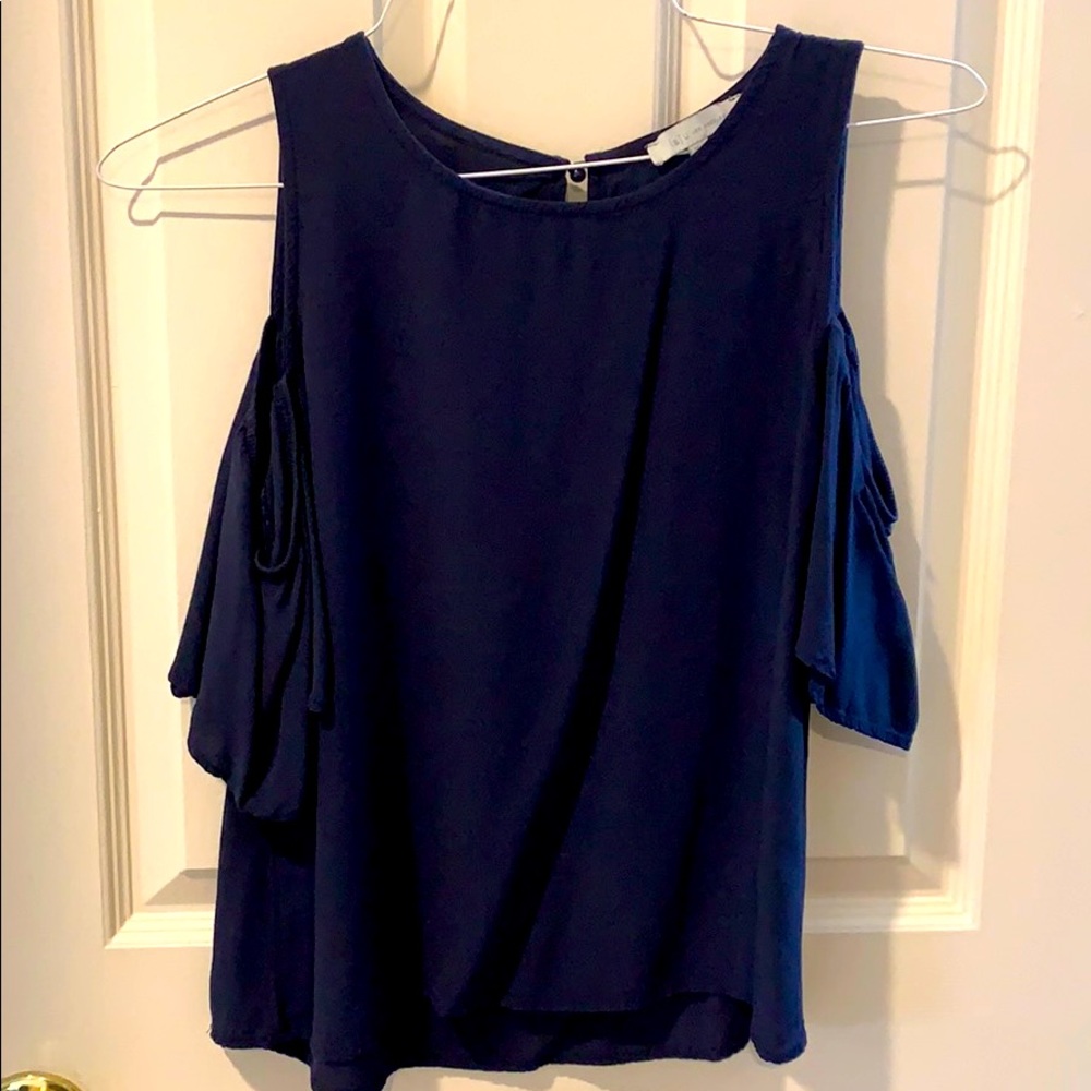 Cold shoulder, flowy sleeved top